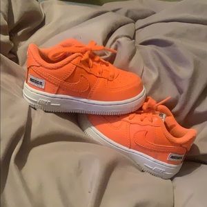 Bright orange Air Force 1’s